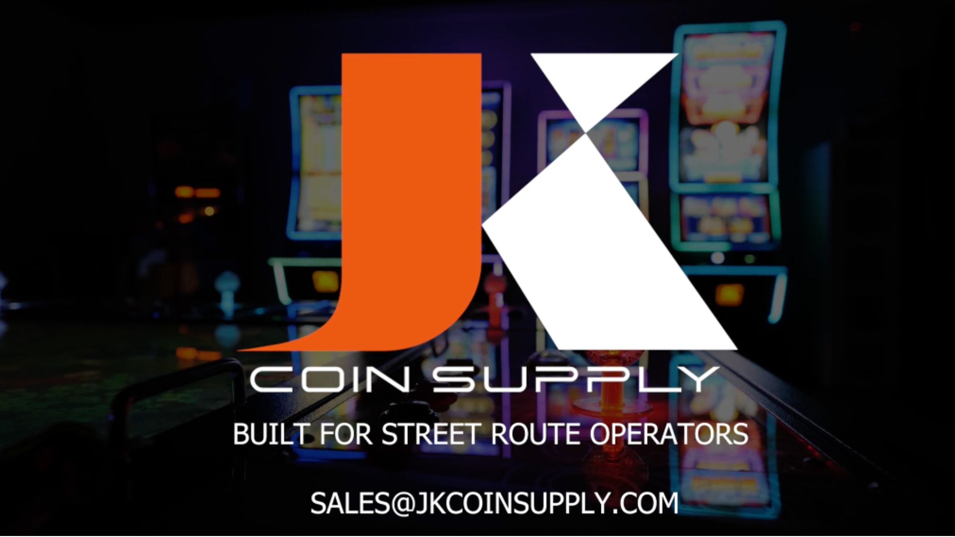 A screenshot from a video of casino machines with the logo for JK Coin Supply overlaid on top.