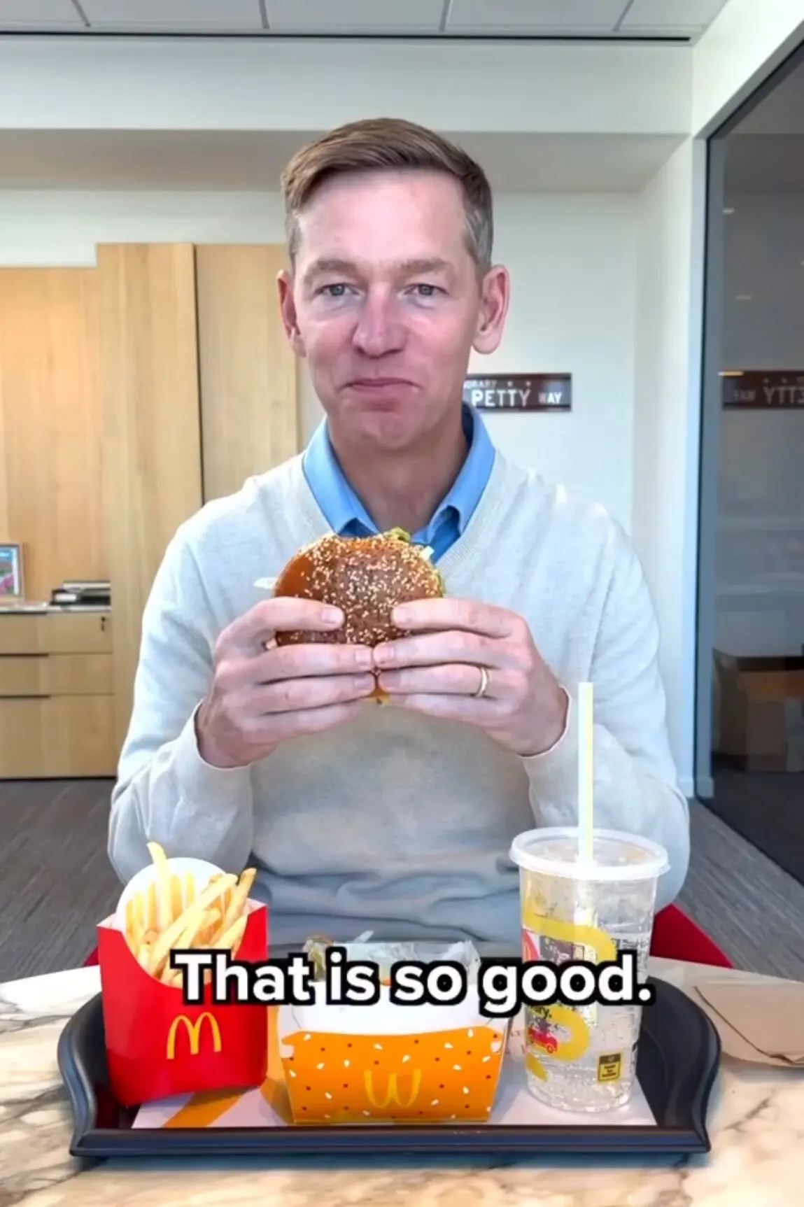 McDonald's CEO eating a burger- screenshot from video